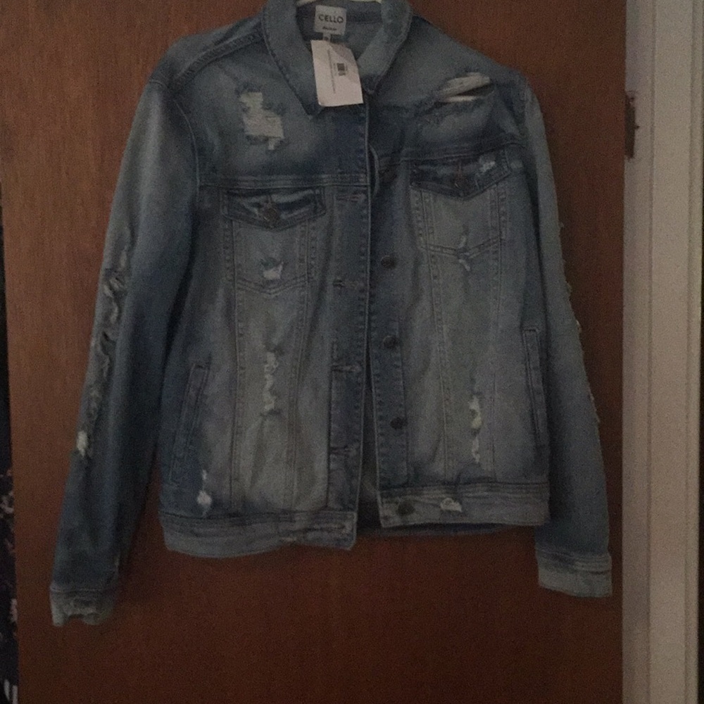 Very NICE distressed jean jacket NEVER WORN!